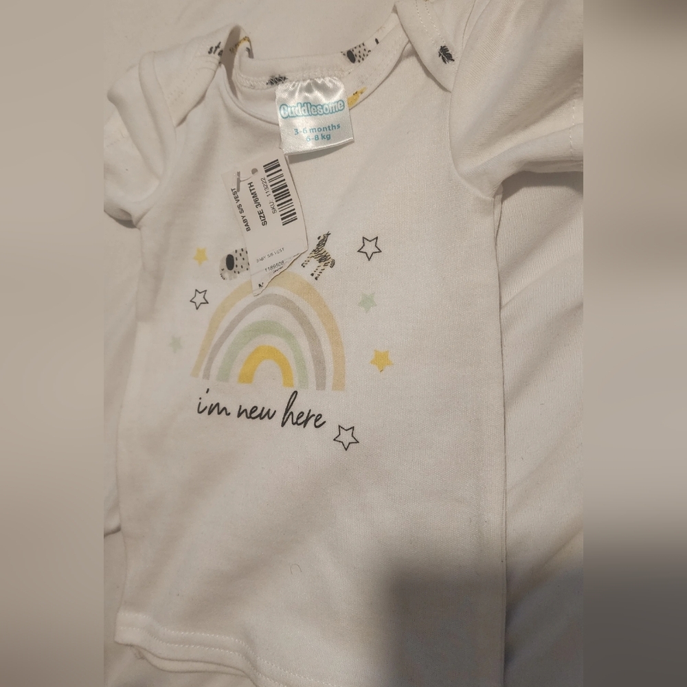 White Baby Onesie with Rainbow Design